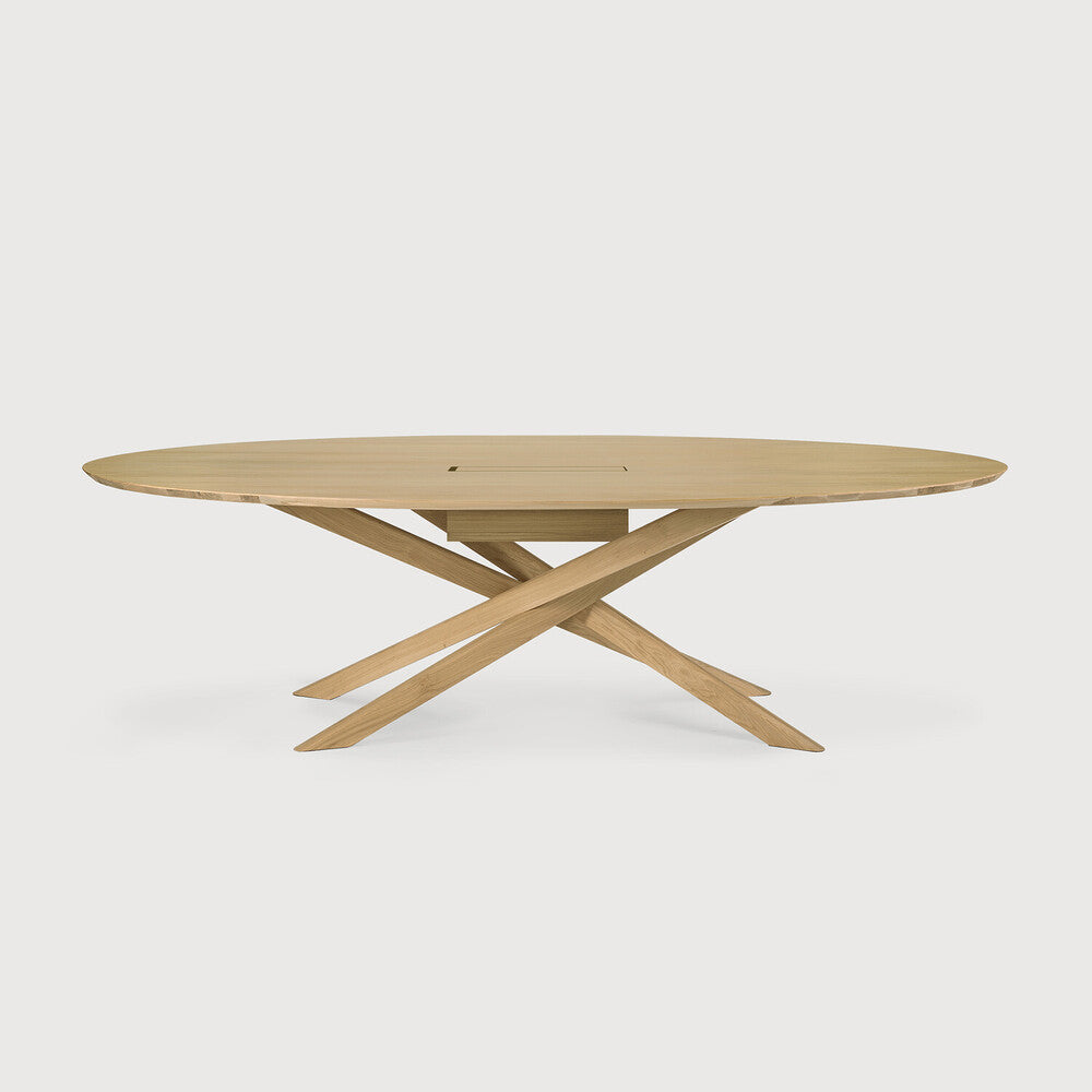 Mesa de reunión Mikado oval en roble y madera de Ethnicraft - vista lateral | Nomad Interiors