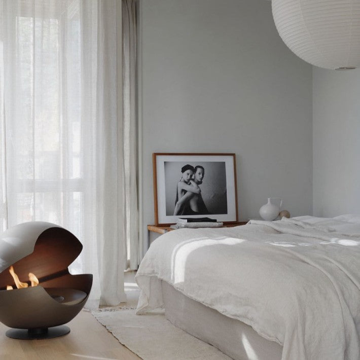 Chimenea Globe Vauni en hierro - vista lateral | Nomad Interiors