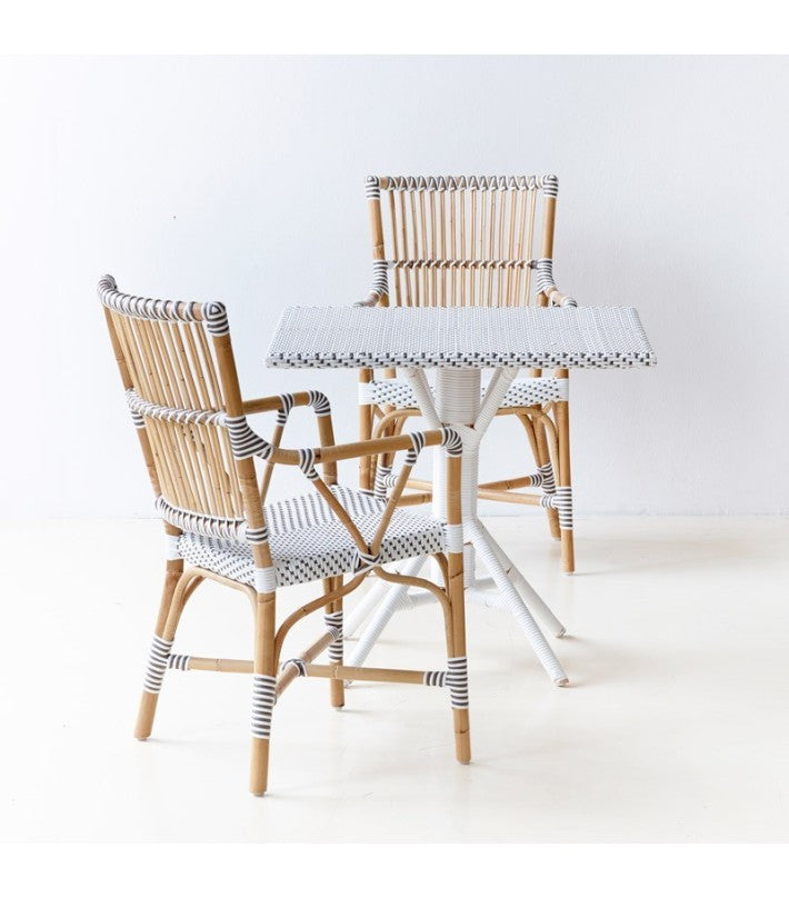 Silla Exterior Monique Arms en ratán y fibra natural de Nomad Home - textura