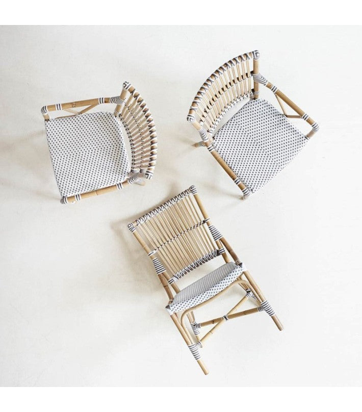 Silla Exterior Monique Arms en ratán y fibra natural de Nomad Home - ambiente