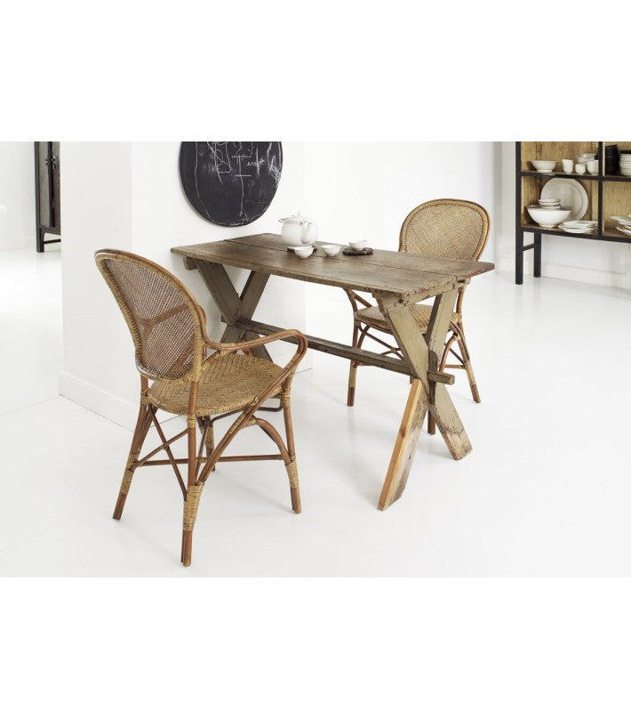 SILLA Rossini Arm Chair | Cherry en ratán de Sika Design - vista lateral | Nomad Interiors